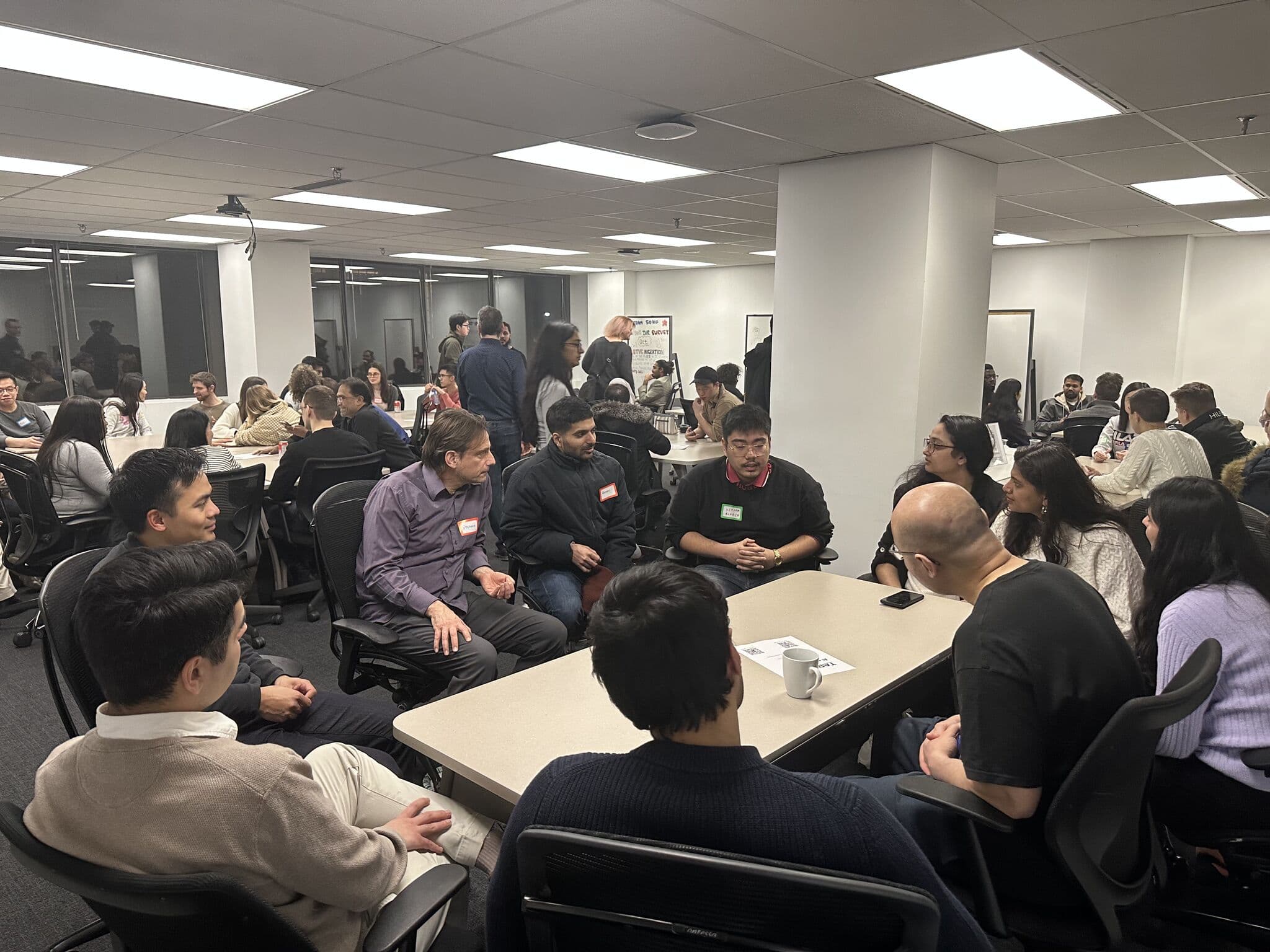 Large group photo of AI professionals at University of Toronto GenAI meetup event