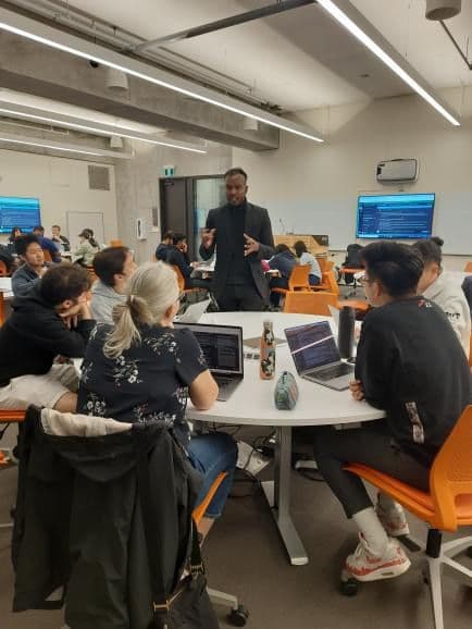 Karan presenting on HCI and A/B testing to students at University of Toronto classroom